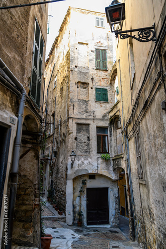 A residential area of narrow alleys, tunnels and stairs in the hillside district La Pigna di Sanremo, the medieval old town of the coastal city of Sanremo, Italy. © Kirk Fisher