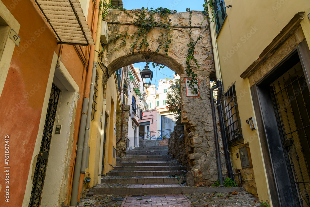 The narrow, hillside twisting alleys, bridges and tunnels in La Pigna di Sanremo, the medieval old town of the coastal city of Sanremo, Italy in the Liguria Imperia region of Northern Italy.