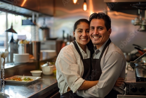 Young Hispanic Entrepreneurs Posing Proudly in Their Kitchen