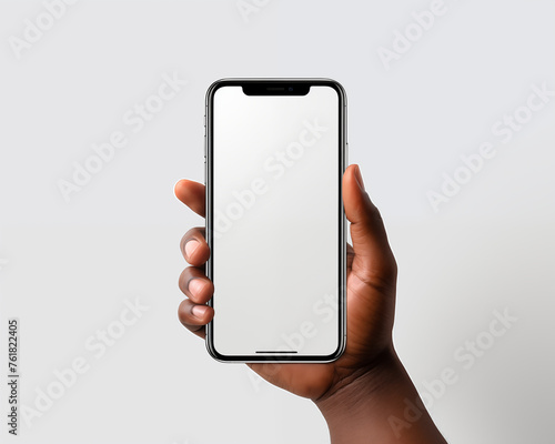 A smartphone Mockup. A hand holding the phone