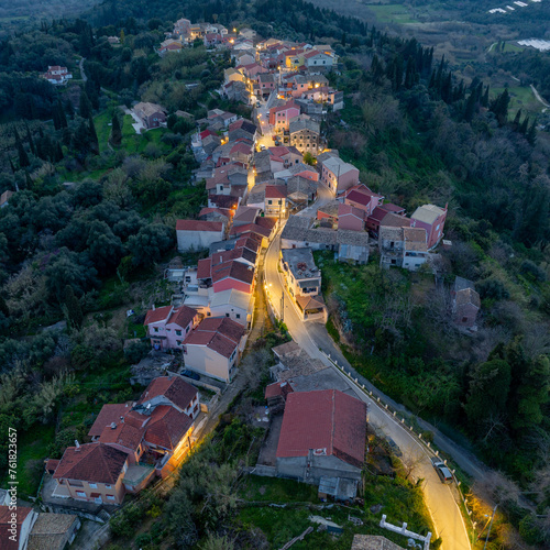 Fototapeta Naklejka Na Ścianę i Meble -  Aerial drone view of traditional Agrafi village in north corfu, Greece by night