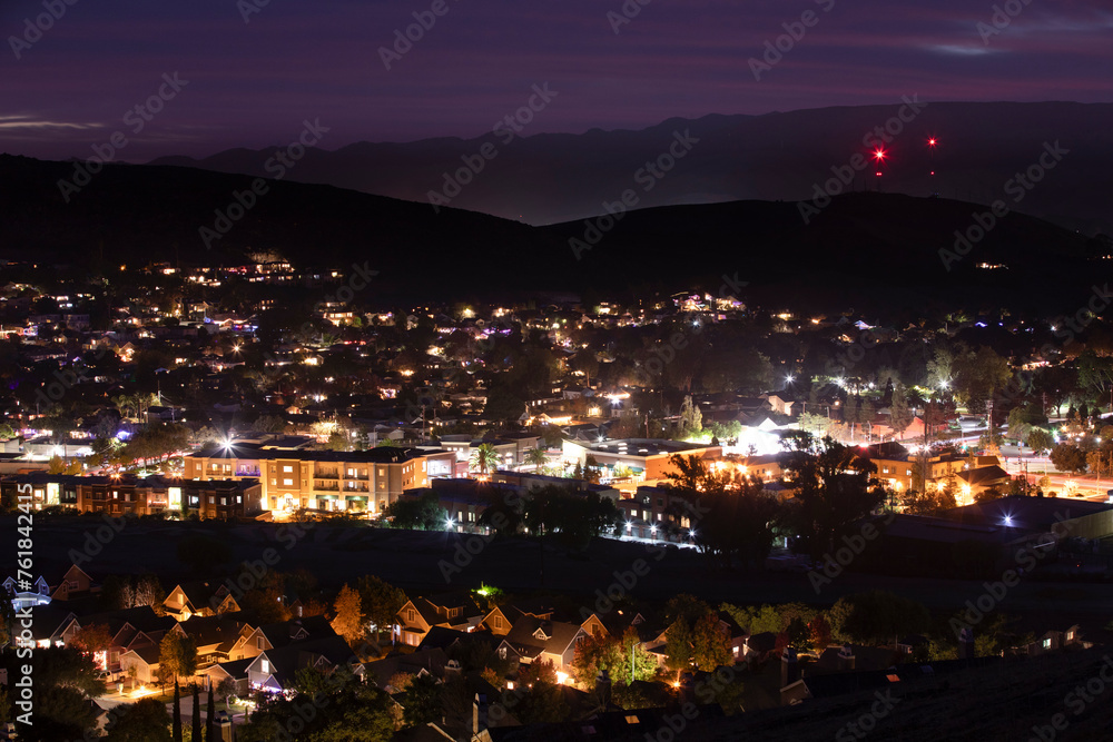 Beautiful elevated twilight sunset view of the evening lights of downtown San Luis Obispo, California, USA.