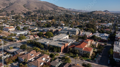 San Luis Obispo, California, USA - December 3, 2021: Aerial view of afternoon light shining on the historic buildings of the downtown core.