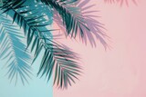 Summer minimal background with shadow from natural palm leaf. Pastel colored aesthetic photo with palm plant.