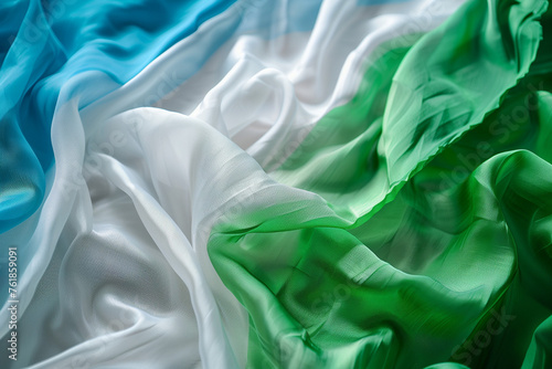 Gay pride flag, coloured stripes on green, white and blue fabric for lgbtq+ backgrounds