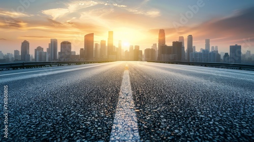 The seamless path of an asphalt road as it carves through the modern cityscape