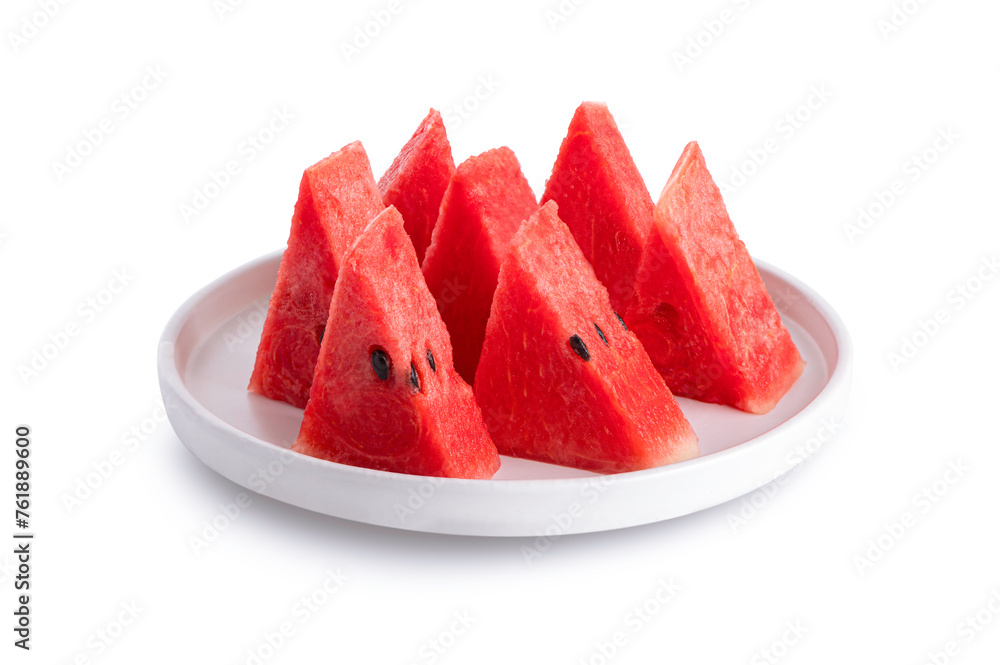 Slice of watermelon on ceramic plate on white background.