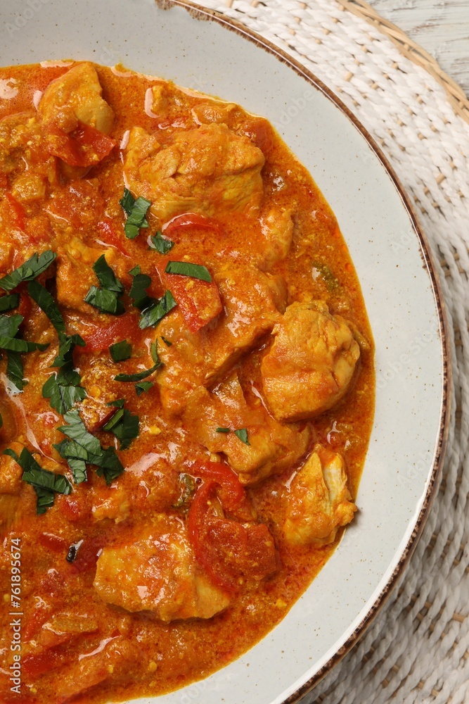 Delicious chicken curry on table, top view Delicious chicken curry on table, top view