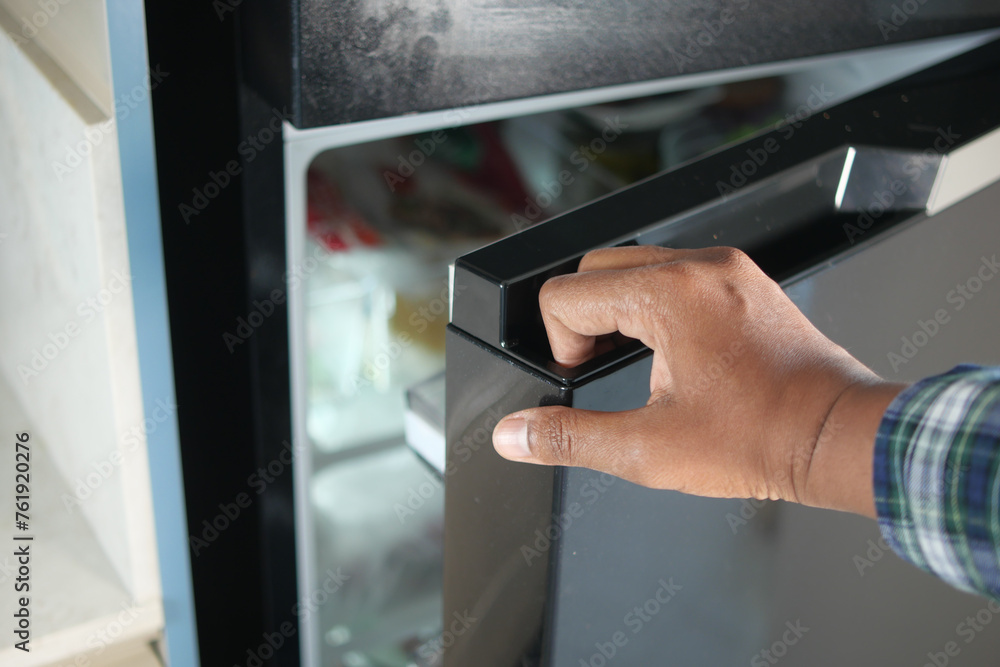 Obraz premium half open fridge with food and vegetables ,