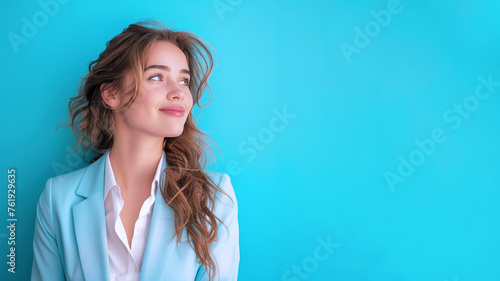 Caucasian businesswoman smile in formal white blue suit look up side view