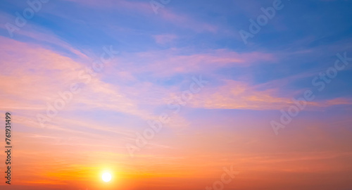 Colorful sunrise sky in the morning with orange sunlight clouds on idyllic horizontal sky background. Beautiful sunset in golden hour time