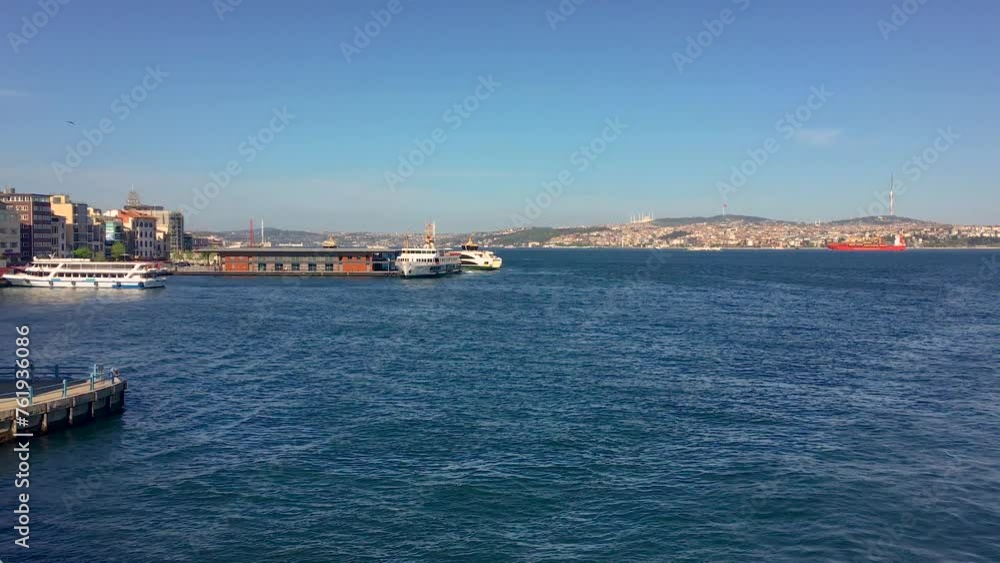 A ferry in Istanbul cruising the Bosporus on a sunny day. A ferry in Istanbul cruising the Bosporus on a sunny day.