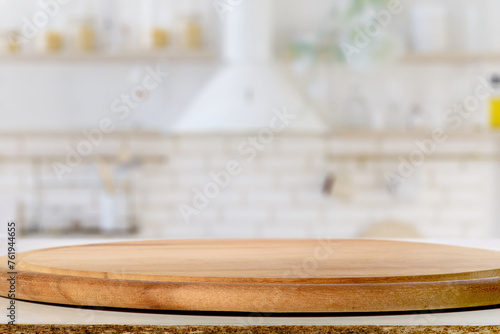 Circular Wooden Cutting Board on Kitchen Countertop