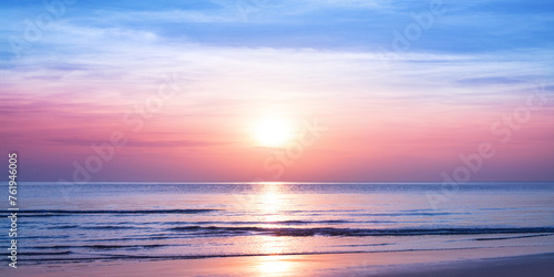 Sunrise on tropical island sea beach panorama, calm ocean sunset landscape, soft pink sky, peaceful morning dawn panoramic view, yellow sun reflection, blue water waves, summer holidays, vacation
