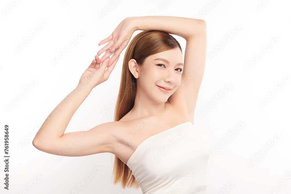 Beautiful Young Asian woman lifting hands up to show off clean and hygienic armpits or underarms on white background, Smooth armpit cleanliness and protection concept Beautiful Young Asian woman lifting hands up to show off clean and hygienic armpits or underarms on white background, Smooth armpit cleanliness and protection concept