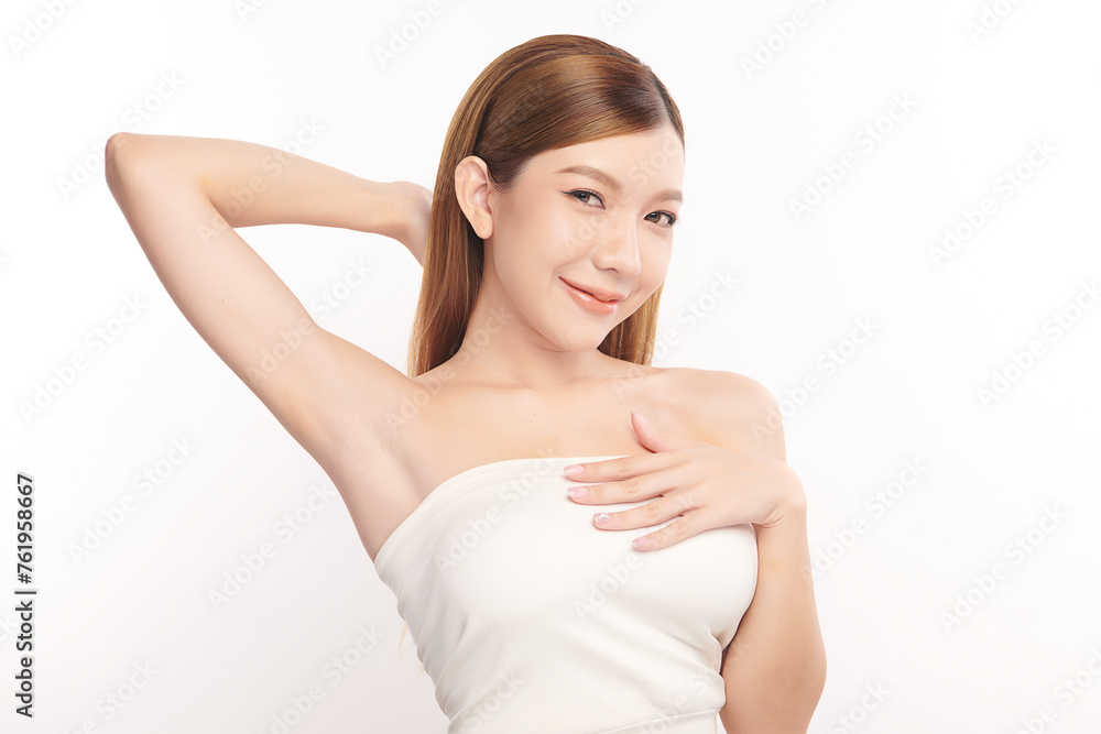 Beautiful Young Asian woman lifting hands up to show off clean and hygienic armpits or underarms on white background, Smooth armpit cleanliness and protection concept Beautiful Young Asian woman lifting hands up to show off clean and hygienic armpits or underarms on white background, Smooth armpit cleanliness and protection concept
