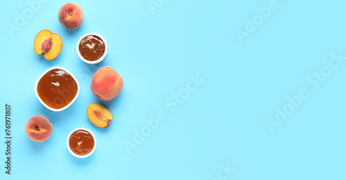 Composition with sweet peach jam and fresh fruit on light blue background with space for text, top view