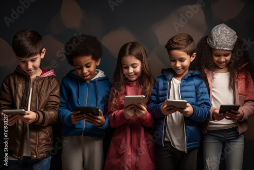 Boys and girls using digital tablet. Children with diverse nationality interacting via technology, such as video calls or social media platforms
