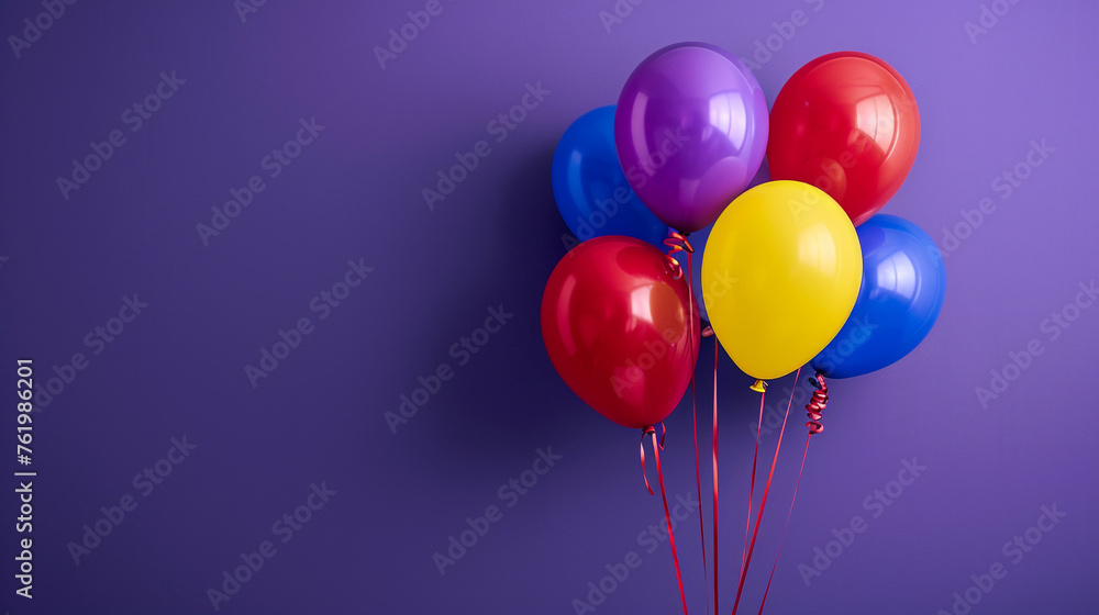A bunch of colorful balloons on purple A bunch of colorful balloons on purple