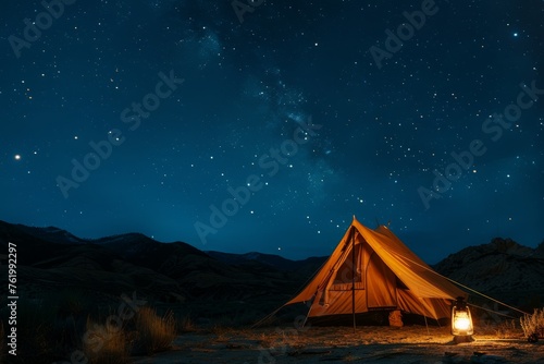 A tent glowing with light stands under the night sky in the desert, creating a cozy atmosphere for camping
