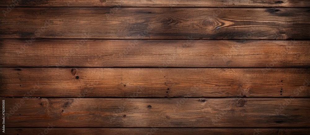 Naklejka premium Close up of wooden wall with dark brown stain