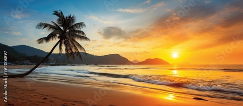 Serenity on the Horizon  Stunning Sunset View of a Tropical Beach with Majestic Palm Tree
