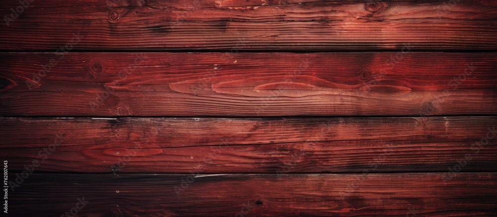 Fototapeta premium A close up of a wooden wall with red paint