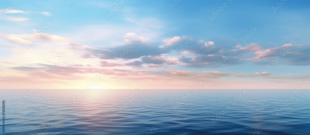 A serene sunset sky over the sea