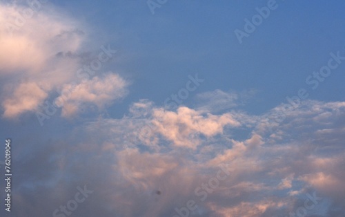 beautiful background photo of evening sky and white clouds © Rifaldi Riwansyah