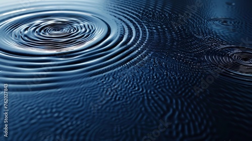 Obraz na płótnie Water rings, ripples on dark blue