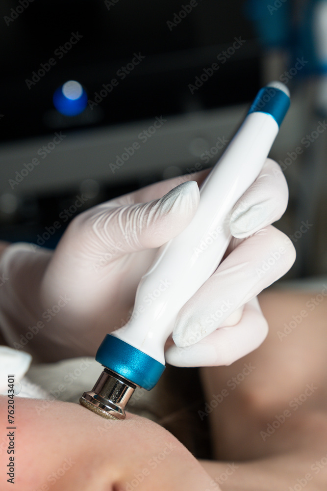 Procedure on the face. Getting photo rejuvenation at cosmetology clinic. Women in beauty salon. Procedure on the face. Getting photo rejuvenation at cosmetology clinic. Women in beauty salon.