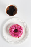 Pink donut and coffee