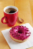 Pink donut and coffee