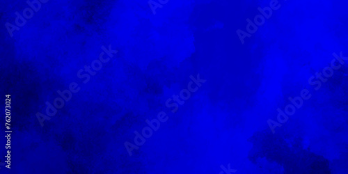 Abstract smoky and grunge blue texture with grunge effect, grunge blue background texture with grainy smoke effect, watercolor painted mottled blue background with vintage marbled texture.