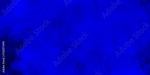 Abstract smoky and grunge blue texture with grunge effect, grunge blue background texture with grainy smoke effect, watercolor painted mottled blue background with vintage marbled texture.