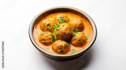 Rich and Creamy Malai Kofta Curry in Stone Finish Bowl on White Background