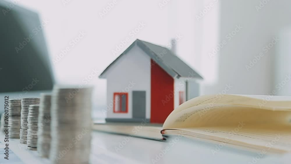 Real estate concept background. House model and coins stack on wooden table, copy space.. Real estate concept background. House model and coins stack on wooden table, copy space..