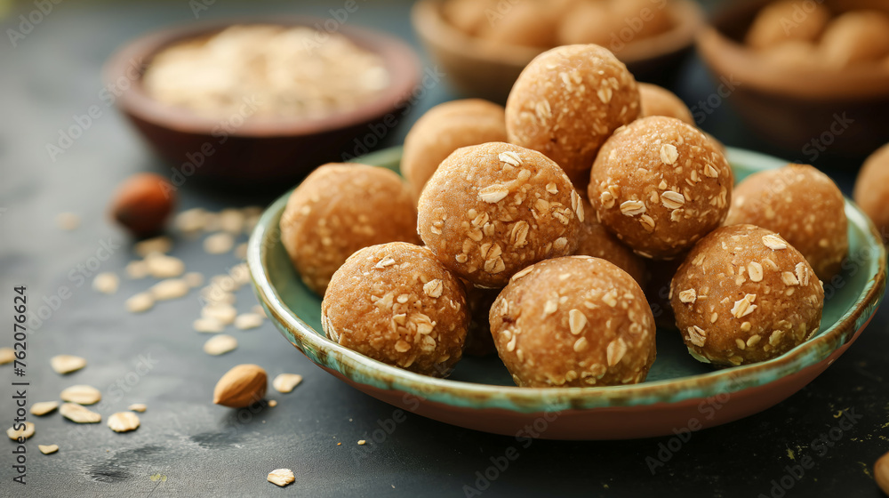 Wholesome oats laddu, also known as protein energy balls, are served in a plate Wholesome oats laddu, also known as protein energy balls, are served in a plate