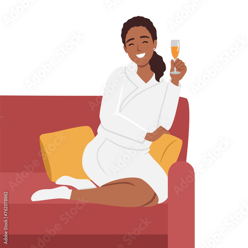 Young beautiful smiling woman sitting with bent legs on a large comfortable sofa with cup of tea or drink. Flat vector illustration isolated on white background