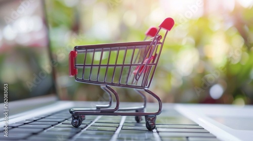 Mini Shopping Cart on Laptop Keyboard, Symbolizing Online Shopping and Digital Commerce,Voice Commerce,Voice Shopping