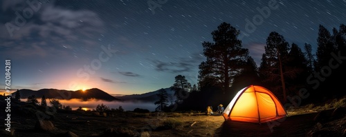 Starry night camping scene in the wilderness