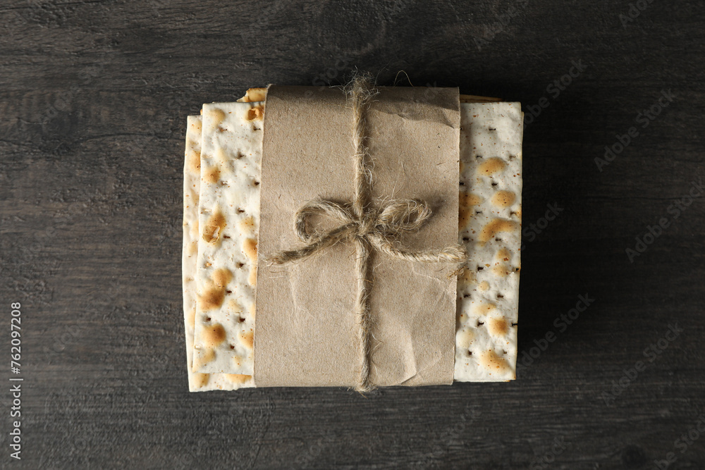 Unleavened Jewish bread on wooden background, top view Unleavened Jewish bread on wooden background, top view