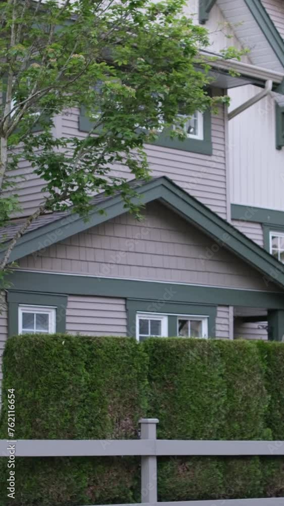Custom built big luxury house with triple garage doors in a residential neighborhood. Suburbs of Vancouver Surrey Canada. Custom built big luxury house with triple garage doors in a residential neighborhood. Suburbs of Vancouver Surrey Canada.