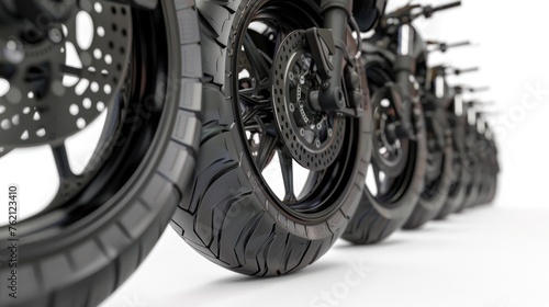 Side view of the front tires of 5 jockey motorcycles in a row. © suteeda