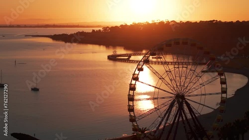 AERIAL Silhouette Of Eastern Beach Geelong During Golden Sunrise photo