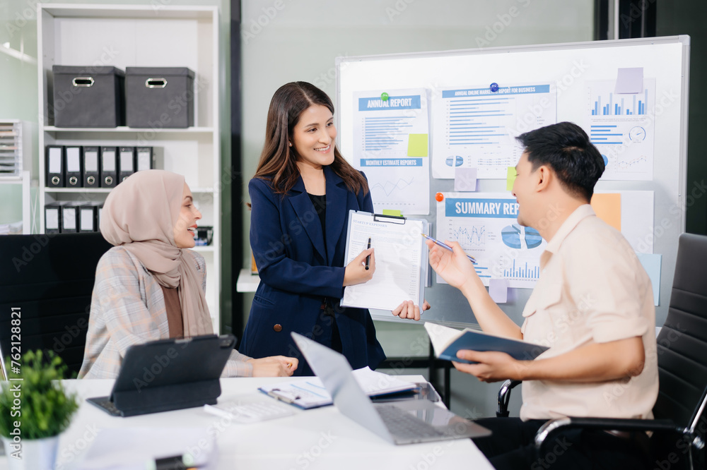 Business team discuss at meeting room. working together with laptop ,tablet and smart phone on desk Financial accountant at office Business team discuss at meeting room. working together with laptop ,tablet and smart phone on desk Financial accountant at office
