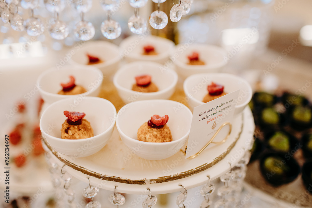Luxury event - finger foods served on elegant plates Luxury event - finger foods served on elegant plates