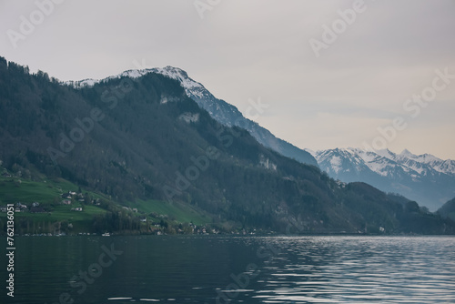 Scenic view of mountains with snowy peaks on lake lucerne.