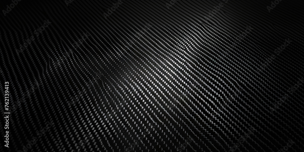 Black carbon fiber background with dark gradient, carbon texture for modern design, black background banner