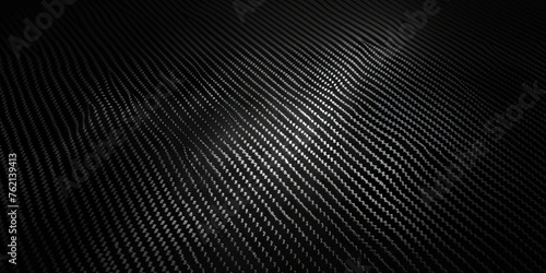 Black carbon fiber background with dark gradient, carbon texture for modern design, black background banner photo